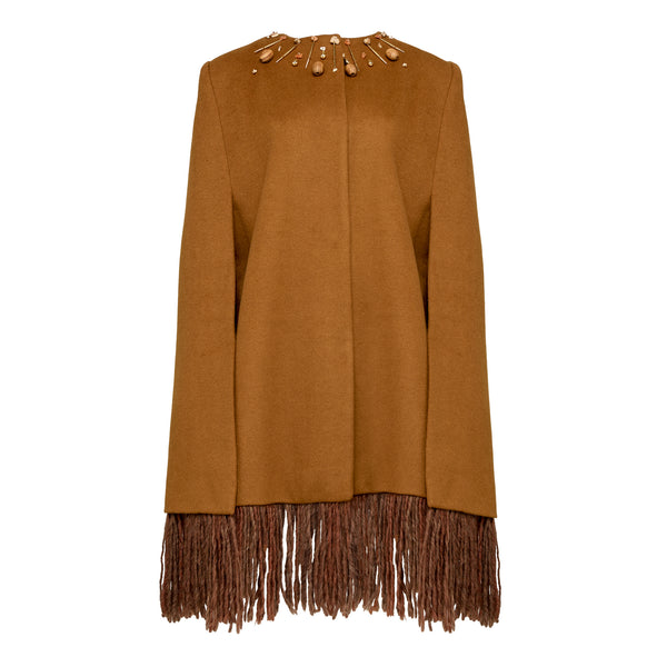Antiope cape: luxurious wool-cashmere blend with flowing lines and bold fringe hem. Hand-embroidered neckline with beads and metal accents. One size. 