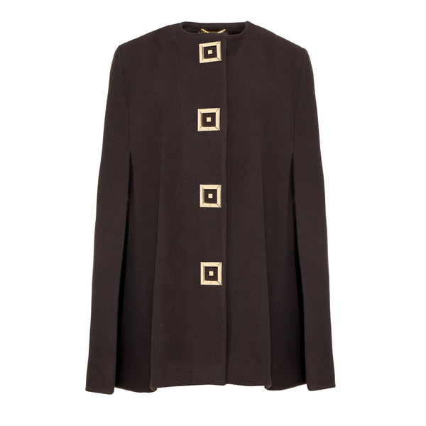Elegant timeless cape with round neckline and side vents. Gold Infinity buttons add modern luxury. 80% virgin wool, 20% cashmere. One size. Handmade. Dry clean.
